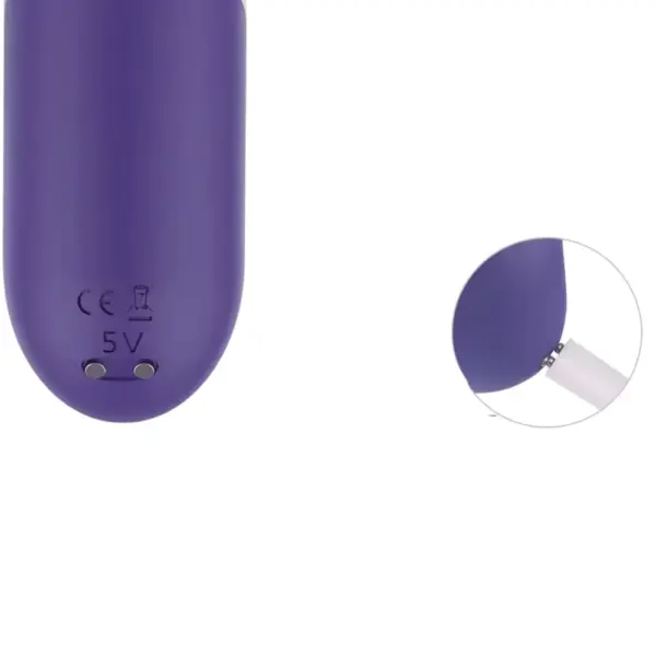 Mini clitoral suction stimulator – TinyTides showing the magnetic USB charging port at the base, with inset of charger connection for easy recharging.