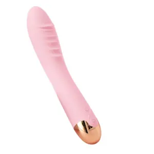 Swirlette vibrator in pink displayed at an angle, highlighting the soft ridges and gold-toned control base with a power button.