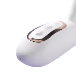 Close-up of the PearlTide’s white handle with gold-trimmed soft-touch control buttons, showing intuitive power and function settings.