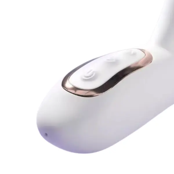 Close-up of the PearlTide’s white handle with gold-trimmed soft-touch control buttons, showing intuitive power and function settings.