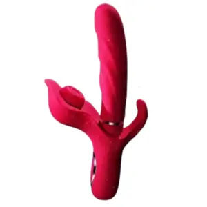 ThrustPetal rabbit vibrator shown in use-ready position with water droplets on the red silicone surface, emphasizing waterproof construction.