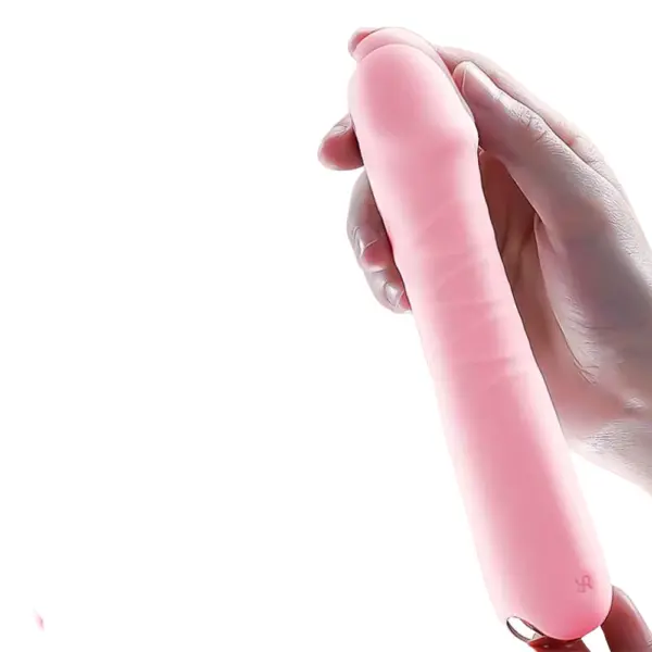 Hand holding the Thrustique vibrating dildo to show its size and flexible texture, emphasizing the natural-looking head and ridges.