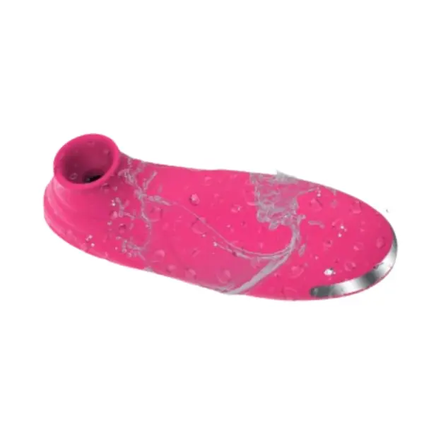 Suction Clitoral Vibrator – Plumora covered in water droplets, illustrating its waterproof build suitable for shower or bath use.