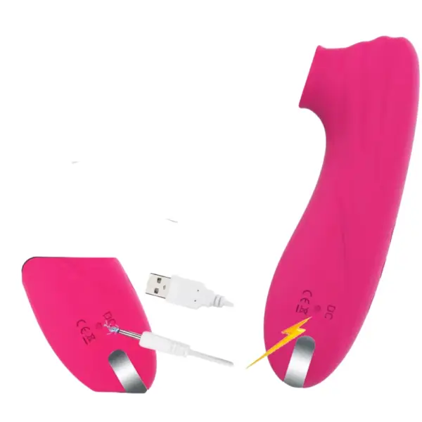 Suction Clitoral Vibrator – Plumora with USB charging cable connected to its port, showing easy recharging for cordless convenience.