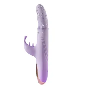 Lavender TapBun rabbit vibrator standing upright with water droplets on the surface, showcasing its waterproof silicone finish and sculpted ridges.