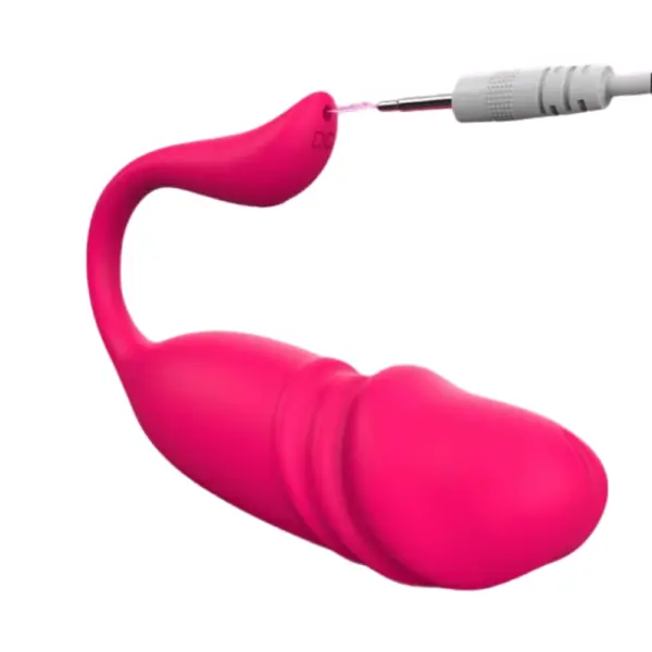 A close-up of the ViviTwist app controlled egg with thruster being charged through its flexible tail using a magnetic charging cable.