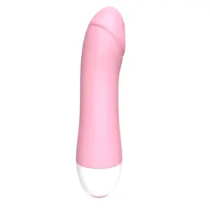 Mini Vibrating Dildo – PocketPop shown in soft pink with a rounded white base and a realistic, slightly curved shape for discreet pleasure.