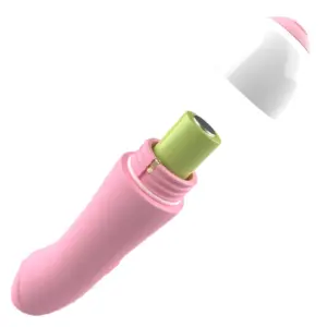 Mini Vibrating Dildo – PocketPop with its white cap removed to reveal the battery compartment and green battery inside for easy replacement.