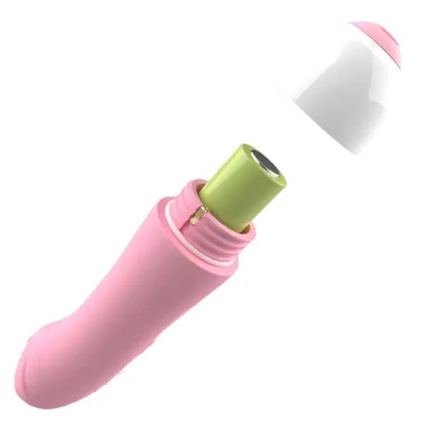 Mini Vibrating Dildo – PocketPop with its white cap removed to reveal the battery compartment and green battery inside for easy replacement.