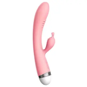 Slim Silicone Rabbit Vibrator – SleekBun in matte pink silicone with a softly curved shaft and petite bunny ear clitoral stimulator designed for gentle dual pleasure.