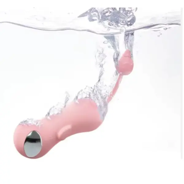 Voltessa submerged in water mid-splash, emphasizing its waterproof silicone build for versatile, safe use in the bath or shower.