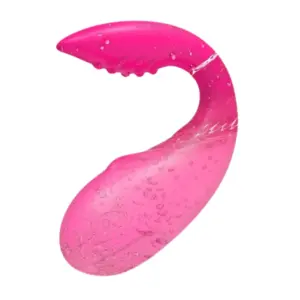 TwinPulse stimulator being splashed with water, showcasing its waterproof silicone body and ergonomic curve for hands-free pleasure.