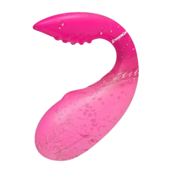 TwinPulse stimulator being splashed with water, showcasing its waterproof silicone body and ergonomic curve for hands-free pleasure.