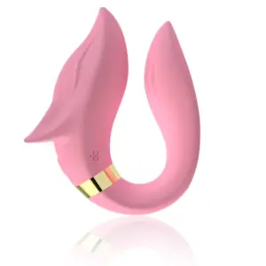 The Foxy Couples Vibrator in pale pink, designed with a smooth silicone finish and playful fox-inspired shape featuring detailed ears and a gold accent band.