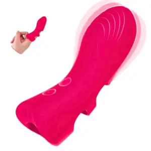 The Glowra Heated Finger Sleeve Vibrator in vivid pink shown in motion, with a curved shape and raised texture for enhanced stimulation.