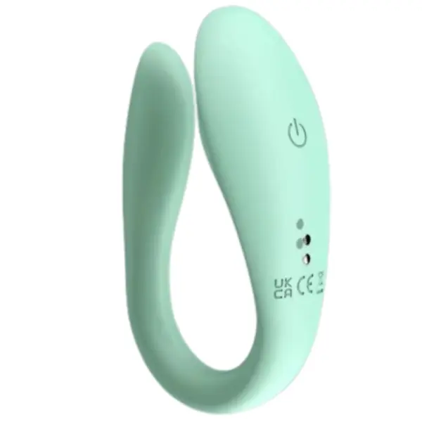 A detailed look at the Mintura Couples Vibrator showing its power button and LED indicators, along with UK and CE certification marks on the silicone body.