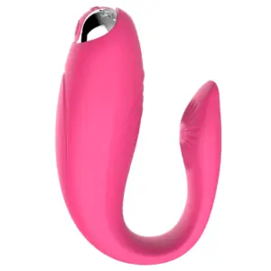 The Orvane Couples Vibrator in red, featuring a sleek silicone design with a curved shape for dual stimulation and a textured inner arm.