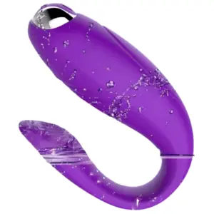 Purple Orvane Couples Vibrator shown underwater with splashes, emphasizing its waterproof body and seamless, body-safe silicone construction.