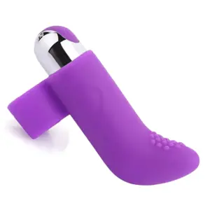 Close-up of the Purvra Finger Vibrator in purple, featuring a smooth silicone body and raised texture at the tip for added stimulation.