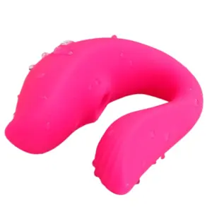 Close-up of the Rosavie Air Pulse Vibrator with water droplets on its surface, highlighting its water-resistant silicone body and dual-ended flexibility.
