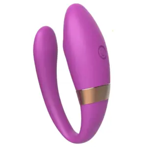 The Veyora Couples Vibrator in bold purple, featuring a U-shaped flexible design with a metallic accent and built-in control button for targeted G and C spot stimulation.