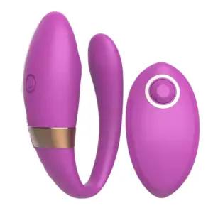 The Veyora Vibrator paired with its sleek purple remote featuring a jewel-like center button, designed for hands-free control and dual-spot pleasure.