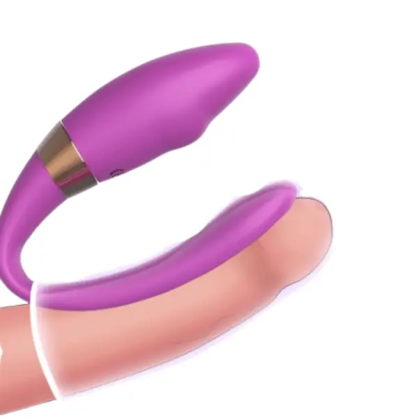 Illustration of the Veyora Couples Vibrator in use, demonstrating its snug internal and external fit designed to stimulate both partners simultaneously.