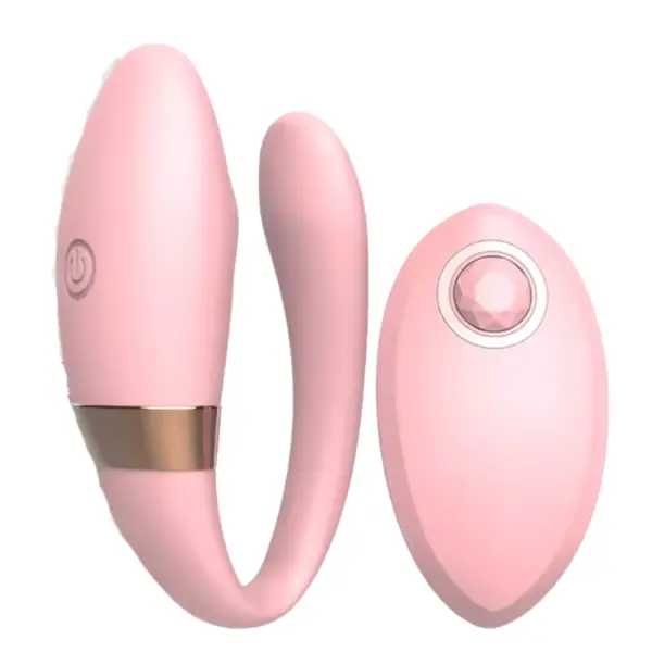 The Veyora Couples Vibrator in soft pink shown with its matching gem-accented remote, designed for precision stimulation and aesthetic appeal.