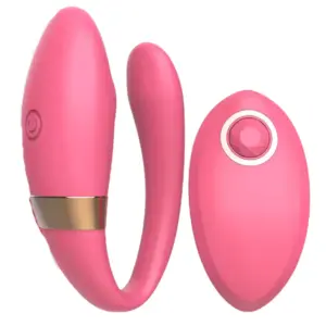 Red version of the Veyora Vibrator with coordinating remote, showcasing its stylish design, ergonomic curves, and dual stimulation focus.