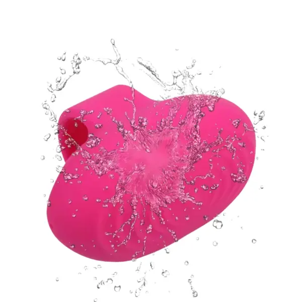 The Vibrosa Ring Finger Vibrator shown mid-splash, emphasizing its waterproof build and textured silicone surface ideal for wet environments.